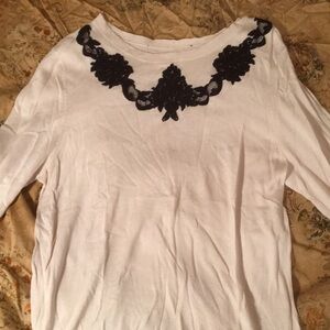 Chic White Cashmere Sweater with Black Lace Accent